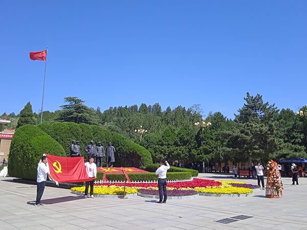 以'两个务必'精神引领作风建设